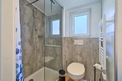 Ein Badezimmer in der Unterkunft Ostseecamp Ferienhaus Strandgeflüster