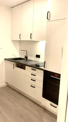 Küche/Küchenzeile in der Unterkunft MeerZeit mit Schwimmbad und Sauna