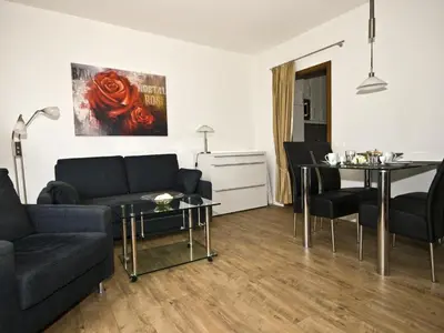 Ein Sitzbereich in der Unterkunft Ferienwohnungen im Hotel Royal