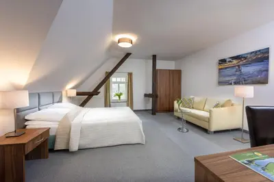 Ein Bett oder Betten in einem Zimmer der Unterkunft Golfpark Ostsee Apartments