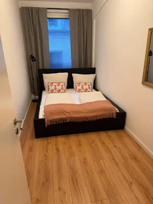 Ein Bett oder Betten in einem Zimmer der Unterkunft Altstadtinsel am Johanneum 22