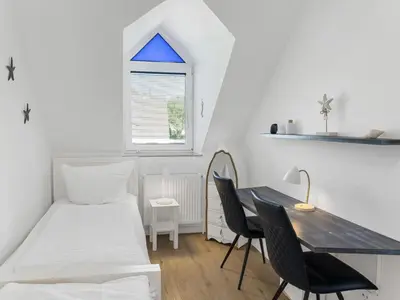 Ein Bett oder Betten in einem Zimmer der Unterkunft Objekt-Nr 31 - Strand - Strandweg