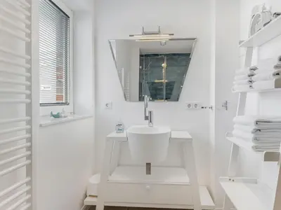 Ein Badezimmer in der Unterkunft Objekt-Nr 31 - Strand - Strandweg