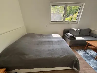 Ein Bett oder Betten in einem Zimmer der Unterkunft Gemütliche 1-Zimmer Gästewohnung
