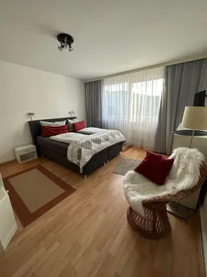 Ein Bett oder Betten in einem Zimmer der Unterkunft Ferienwohnung Timmdema