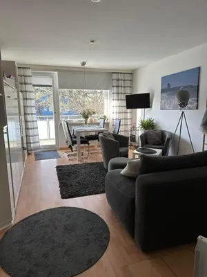 Ein Sitzbereich in der Unterkunft Ferienwohnung Timmdema