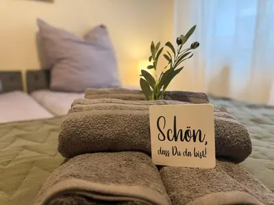 Ein Bett oder Betten in einem Zimmer der Unterkunft Oda Living