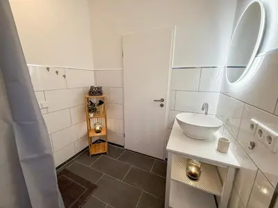 Ein Badezimmer in der Unterkunft Oda Living
