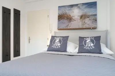 Ein Bett oder Betten in einem Zimmer der Unterkunft Hang 15 Rosis Jolle