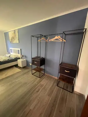 Ein Bett oder Betten in einem Zimmer der Unterkunft GartenOase Lübeck