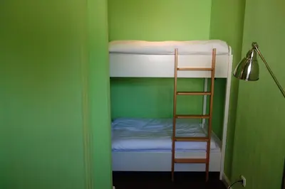 Ein Etagenbett oder Etagenbetten in einem Zimmer der Unterkunft Strand 1 Travemünde