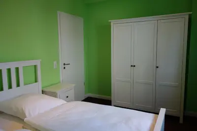 Ein Bett oder Betten in einem Zimmer der Unterkunft Strand 1 Travemünde