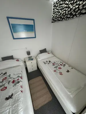 Ein Bett oder Betten in einem Zimmer der Unterkunft 3 Zimmer in Sierksdorf, nah am Strand & HansaPark