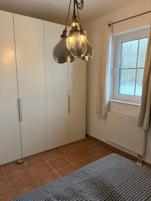 Ein Bett oder Betten in einem Zimmer der Unterkunft Strandperle