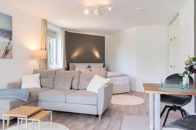 Ein Sitzbereich in der Unterkunft Ferienwohnung Die Hanse 14 Scharbeutz