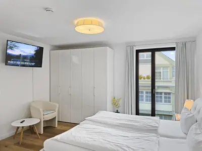 Ein Bett oder Betten in einem Zimmer der Unterkunft Objekt-Nr 132 - Hafen - Kurgartenstraße