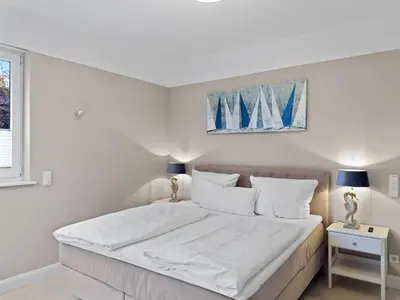 Ein Bett oder Betten in einem Zimmer der Unterkunft Objekt-Nr 177 - Strand - Achterdeck