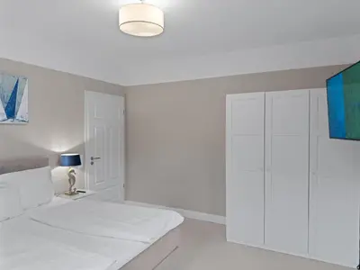 Ein Bett oder Betten in einem Zimmer der Unterkunft Objekt-Nr 177 - Strand - Achterdeck