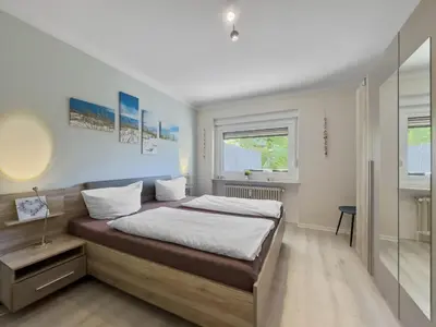 Ein Bett oder Betten in einem Zimmer der Unterkunft Objekt-Nr 211 - Ort - Nordmeerstraße