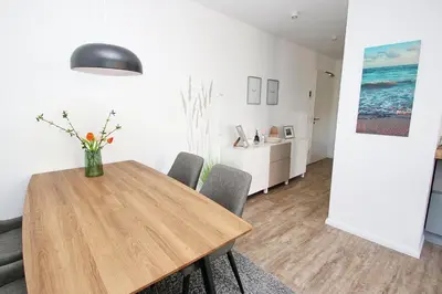 Ein Sitzbereich in der Unterkunft Dünenhaus Steuerbord, Fewo 112