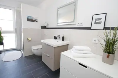 Ein Badezimmer in der Unterkunft Dünenhaus Steuerbord, Fewo 112