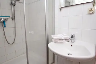 Ein Badezimmer in der Unterkunft Alfred-Hagelstein-Straße, Fewo 159