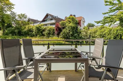 Ein Balkon oder eine Terrasse in der Unterkunft Dünenhaus Steuerbord, Fewo 138
