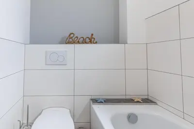 Ein Badezimmer in der Unterkunft Haus Aaron Fehlingstraße, Fewo 221