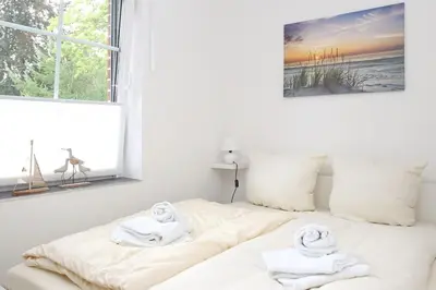 Ein Bett oder Betten in einem Zimmer der Unterkunft Haus Aaron Fehlingstraße, Fewo 224