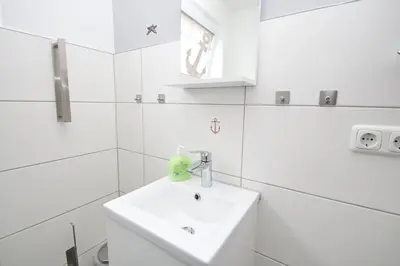Ein Badezimmer in der Unterkunft Haus Aaron Fehlingstraße, Fewo 222