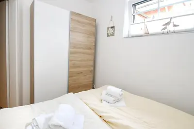 Ein Bett oder Betten in einem Zimmer der Unterkunft Haus Aaron Fehlingstraße, Fewo 222