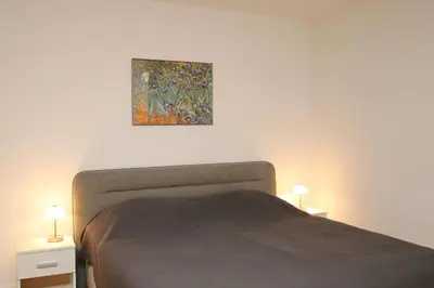 Ein Bett oder Betten in einem Zimmer der Unterkunft Kaiserallee, Fewo 130