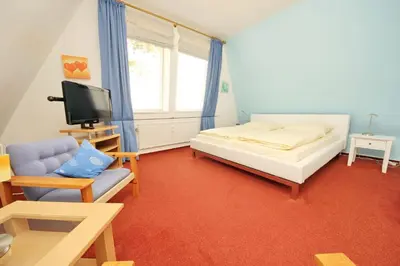 Ein Bett oder Betten in einem Zimmer der Unterkunft Kaiserallee, Fewo 105 Kaiserblick
