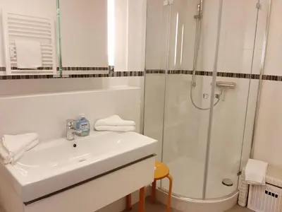 Ein Badezimmer in der Unterkunft Kaiserallee, Fewo 117