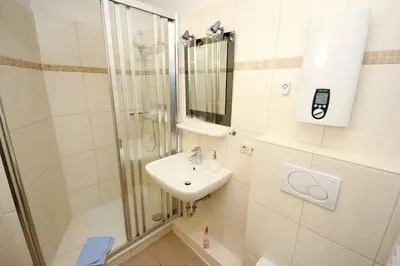 Ein Badezimmer in der Unterkunft Strandblick, Fewo 164