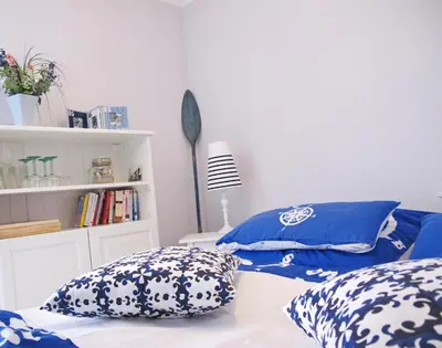 Ein Bett oder Betten in einem Zimmer der Unterkunft Strandredder, Fewo 103
