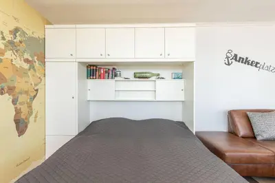 Ein Bett oder Betten in einem Zimmer der Unterkunft Strandblick, Fewo 165
