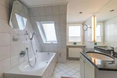 Ein Badezimmer in der Unterkunft Kurgartenstraße, Ferienhaus 158