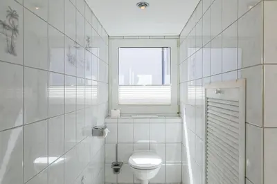 Ein Badezimmer in der Unterkunft Kurgartenstraße, Ferienhaus 158