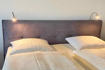 Ein Bett oder Betten in einem Zimmer der Unterkunft Kaiserallee, Fewo 215