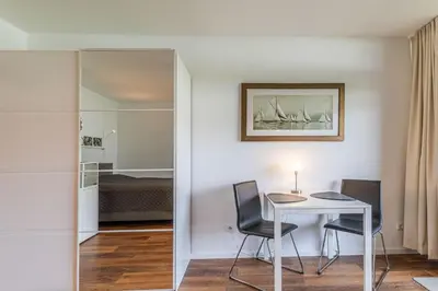 Ein Bett oder Betten in einem Zimmer der Unterkunft Kaiserallee, Fewo 182