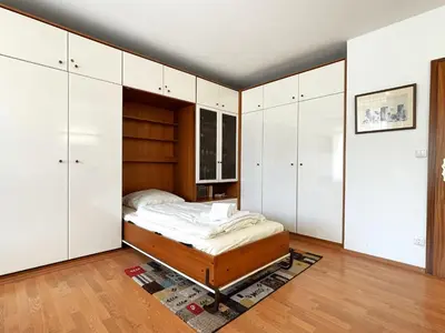 Ein Bett oder Betten in einem Zimmer der Unterkunft Kaiserallee, Fewo 200