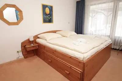 Ein Bett oder Betten in einem Zimmer der Unterkunft Kaiserallee, Fewo 190