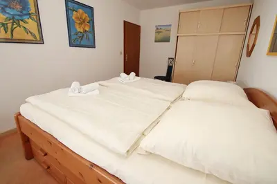Ein Bett oder Betten in einem Zimmer der Unterkunft Kaiserallee, Fewo 190