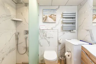 Ein Badezimmer in der Unterkunft Trelleborgallee Fewo 104