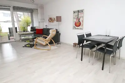 Ein Sitzbereich in der Unterkunft Strandredder, Fewo 114