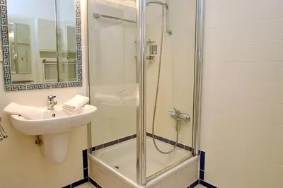 Ein Badezimmer in der Unterkunft Strandredder, Fewo 114
