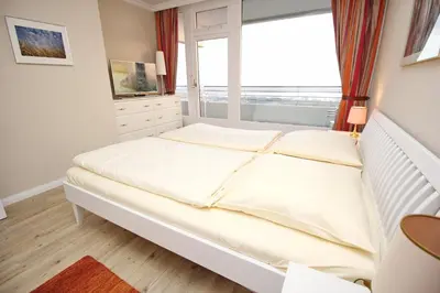 Ein Bett oder Betten in einem Zimmer der Unterkunft Trelleborgallee, Fewo 149