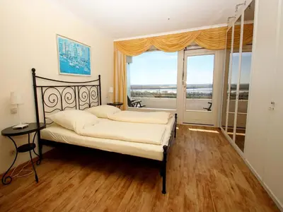 Ein Bett oder Betten in einem Zimmer der Unterkunft Trelleborgallee, Fewo 147