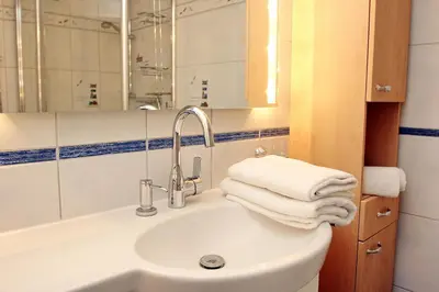 Ein Badezimmer in der Unterkunft Trelleborgallee, Fewo 146